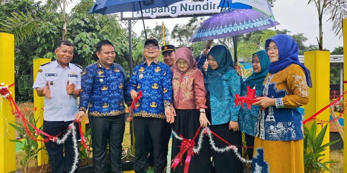 Hujan-Hujanan Bupati Tabalong Resmikan RTH Desa Kupang Nunding