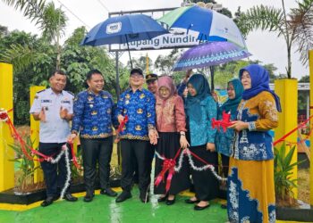 Hujan-Hujanan Bupati Tabalong Resmikan RTH Desa Kupang Nunding