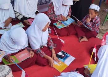 Dukung 7 Program Prioritas Bupati, Dispersip Tabalong Hadirkan Literasi Ceria di Program “Bunga Desa” di Padangin