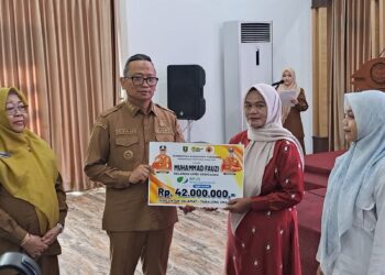 Ahli Waris Relawan UPBS di Tabalong Terima Uang Santunan Rp 42 juta