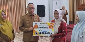 Ahli Waris Relawan UPBS di Tabalong Terima Uang Santunan Rp 42 juta